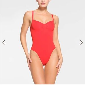 Skims seamless sculpt thong bodysuit in ruby - Sold out on Skims website